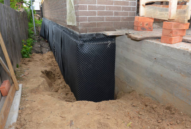SJ Waterproofing Pros technician performing targeted Waterproofing assessment in North Olmsted, OH